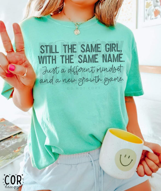 Still the same girl, with the same name.  Just a different mindset and a new growth game Graphic Tee